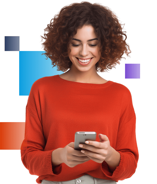 Young professional woman in a red sweater looking at a smartphone